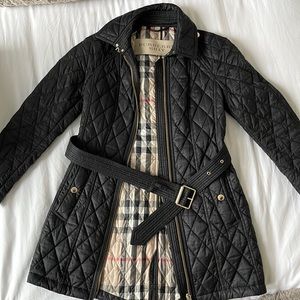 Burberry women’s quilted black belted jacket